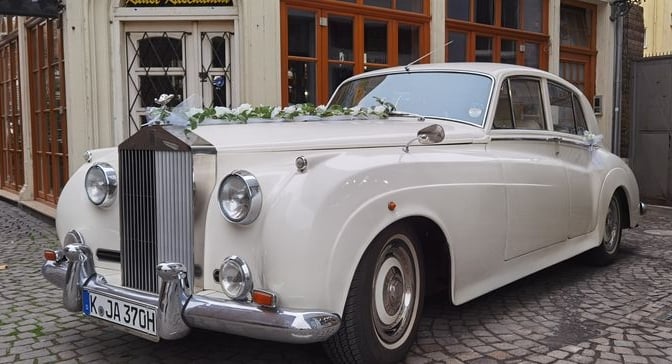 Hochzeitsautos in weiss – London Taxi – Wedding Rolls Royce